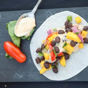 Black Bean and Mango Relish Jicama Wrap makes a sweet and spicy vegetarian meal -- no cooking!