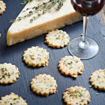 Gluten Free Asiago Almond Crackers are perfectly paired with a glass of wine!