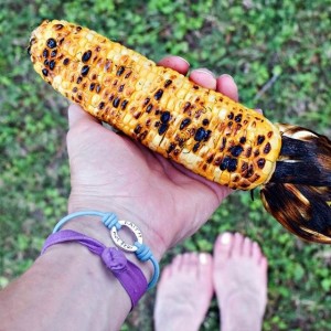 grilled corn in hand square
