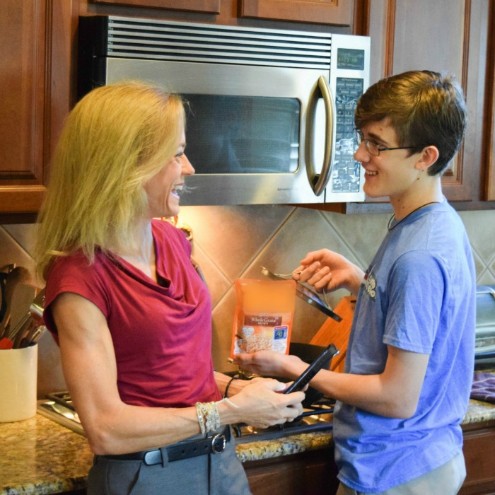 mother and son cooking together
