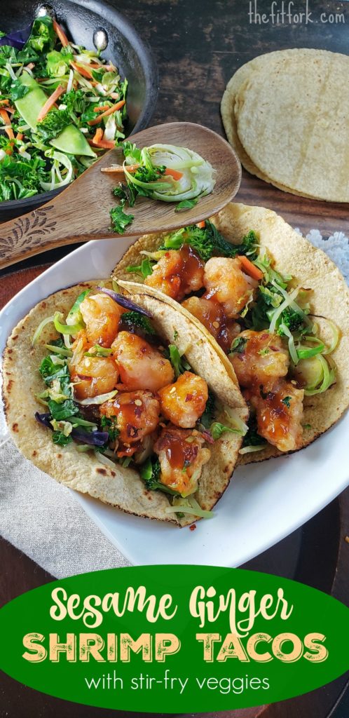 Sesame Ginger Shrimp Tacos with Stir Fry Veggies is an under-30 minute meal that is made healthier by oven baking the shrimp rather than frying -- still crunch and delicious with a gluten-free breading! Stir fry vegetables add colorful nutrition and can be adjusted to your preferences.