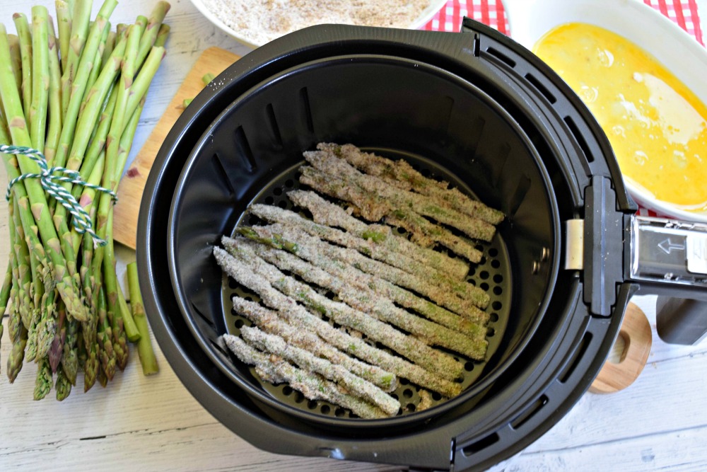 prepping asparagus fries for air fryer