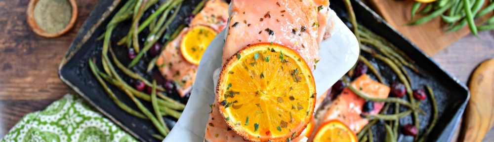 Cranberry Orange Sheet Pan Salmon -- a 30 minute, one dish meal suitable for both busy weeknights and even elegant dinners.