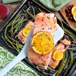 Cranberry Orange Sheet Pan Salmon -- a 30 minute, one dish meal suitable for both busy weeknights and even elegant dinners.