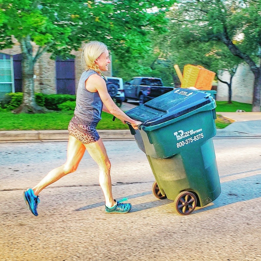 running with trash can