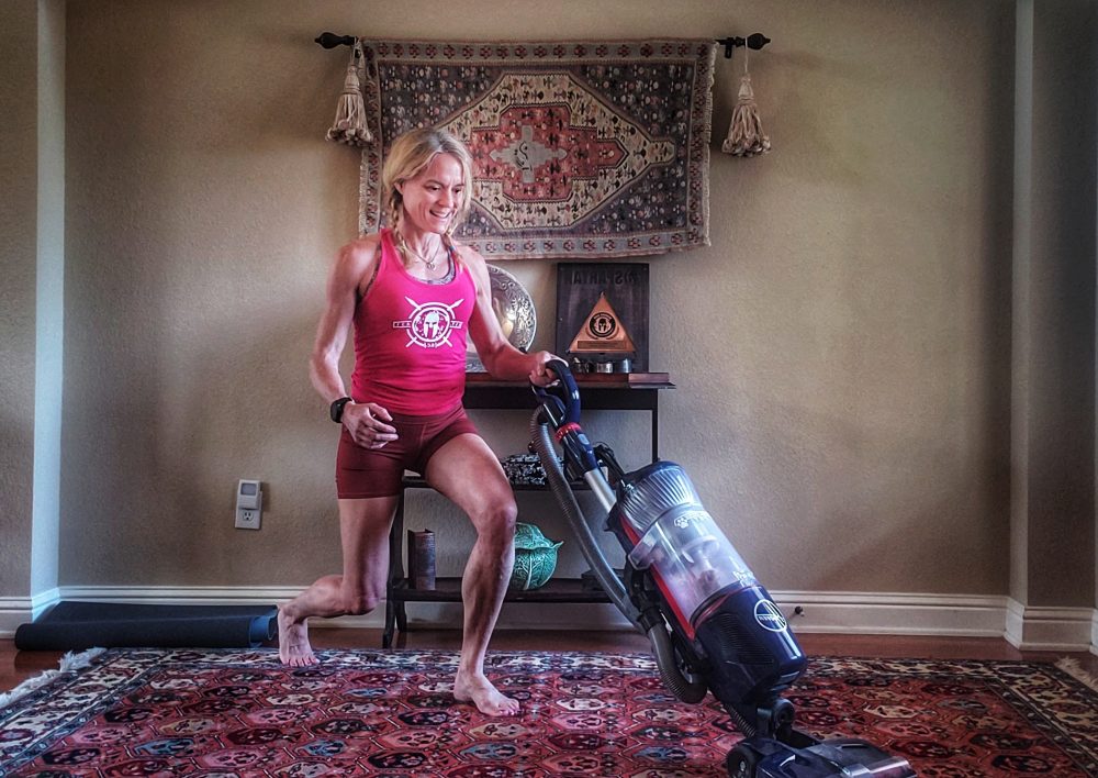 Vacuuming lunges home workout during chores