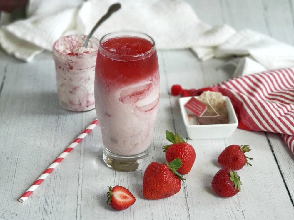Think pink, drink pink! This fun, refreshing beverage made with raspberry tea, almond milk, collagen and strawberries has just 60 calories per serving and 1.4g net carb - but 7g protein! It's a copycat Starbucks recipe from their summer menu. Keto and Paleo friendly