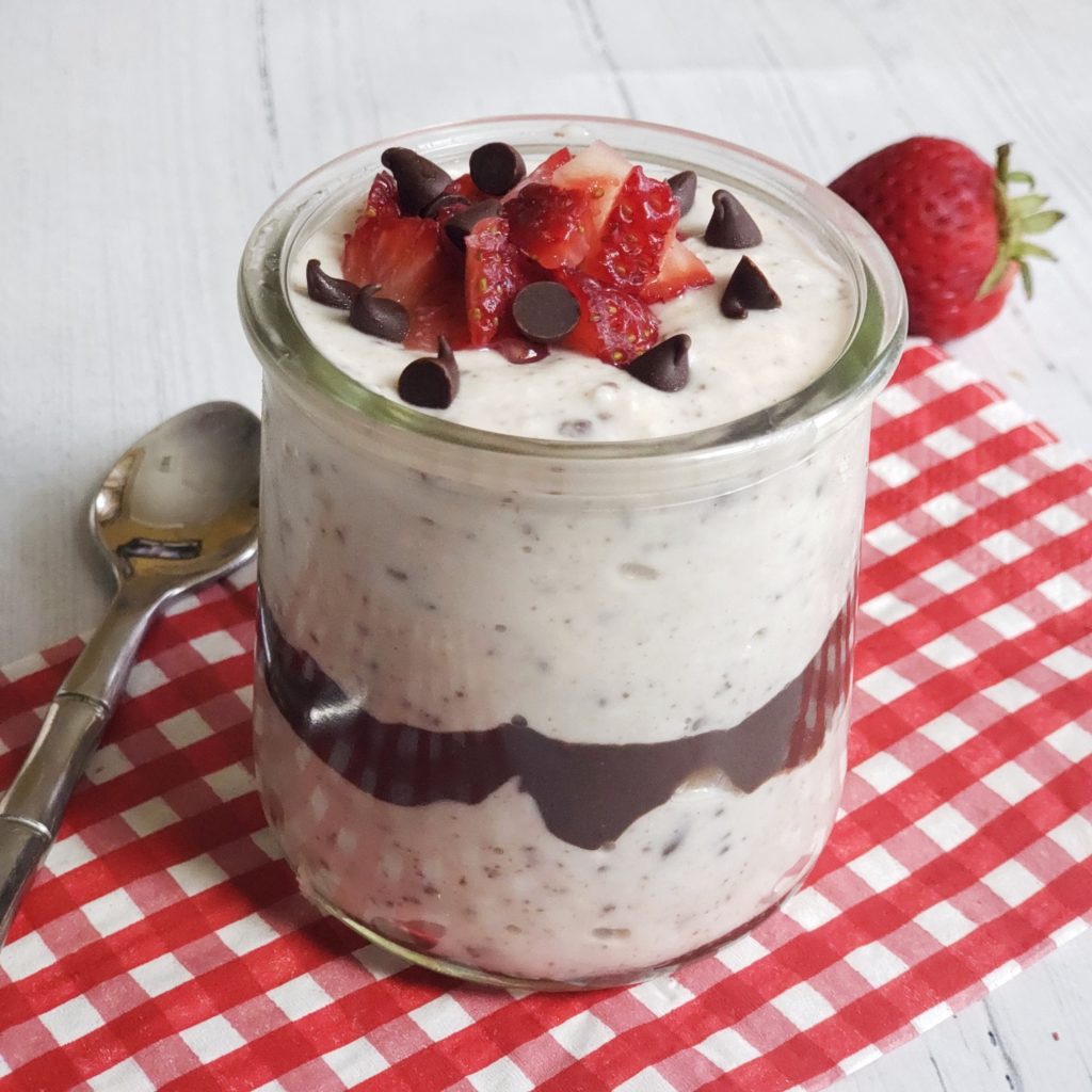 This no added sugar cheesecake dessert features cottage cheese and collagen blended until creamy -- sugar free chocolate chips and strawberries put this no-bake, no crust, lower carb, single-serve recipes over the top.