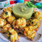 Delicious baked rice balls loaded with cheese and veggies are perfect for dunking in mild salsa verde! The secret to maximum flavor is also using the salsa as part of the cooking liquid in the rice! Surprising low cal and lower carb -- 56 calories and 6g carbs per piece. An appetizer and snack that makes everyone happy!