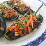 An Asian street-food inspired stuffed poblano pepper made with sirloin beef, caramelized onions, a sweet-savory Kalbi sauce, plus unique crispy cracker topping and kimchi mayo finish -- it's a creative and unique fusion! You'll love this quirky but delicious dish for Korean BBQ Beef-stuffed Peppers with Gochujang Butter Crumb Topping and Kimchi Mayo Drizzle. Sponsored by Lucky Foods.