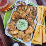 A low-carb, gluten-free and keto-friendly way to snack and get more vegetables in your day! These easy air fryer zucchini chips use just a few simple ingredients and are done in minutes – perfect for game day entertaining or a delicious side dish and alternative to fries.