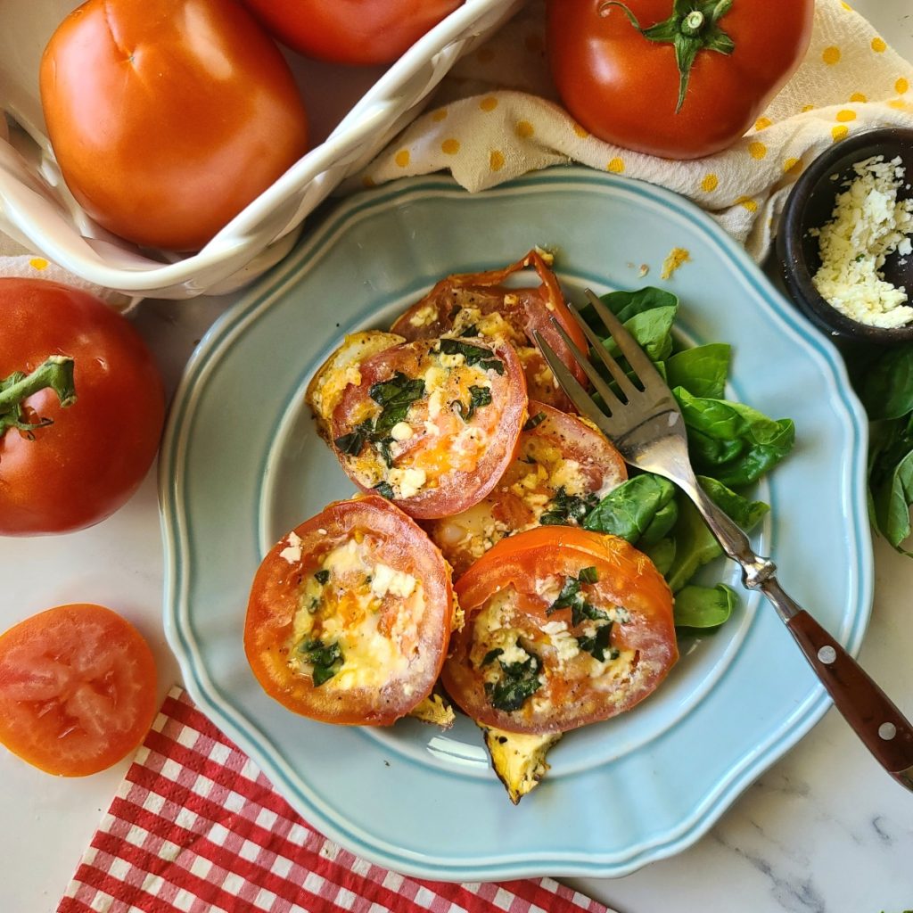 Any which way you slice it, this quick egg recipe is delicious and tastes like summer with sweet, ripe tomato, herby basil and salty feta cheese.  Low-cal, but still lots of protein, a great quick breakfast or lunch idea.