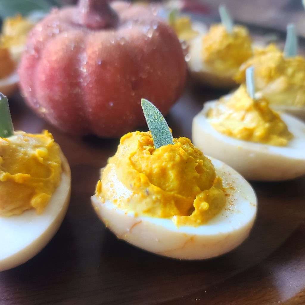 These clever deviled eggs look like little autumn pumpkins, but contain no squash – only eggs, Dijon mustard, salt, pepper and turmeric for the signature orange hue of the season. Low in calories, high in protein – a smart snack for Halloween, Thanksgiving or any fall festival.