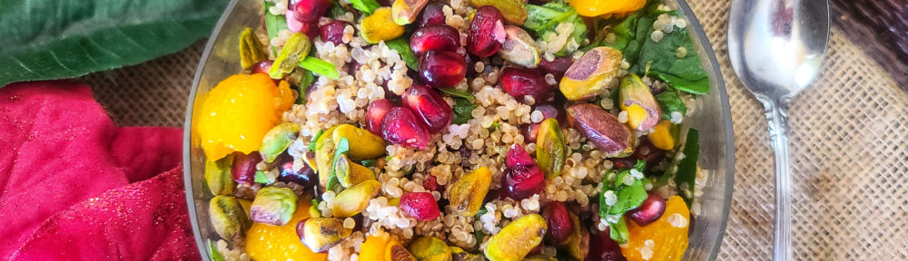 Transform plain quinoa into something to celebrate for the holiday season! Pomegranate, orange segments and pistachios bejewel this quick, easy and nourishing vegetarian salad that is equally beautiful for a dinner party or quick lunch!