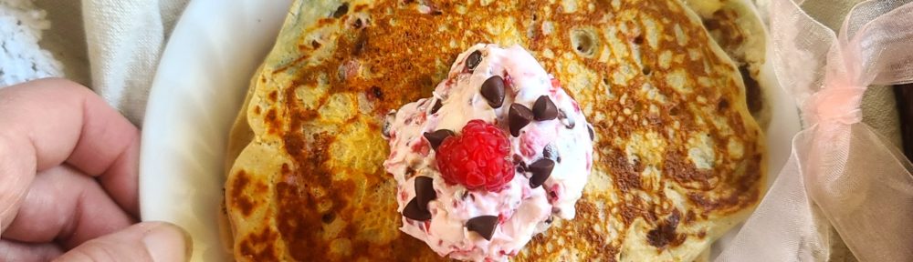 Raspberry Protein Pancakes with Cheesecake Topping makes a tasty breakfast that feels indulgent, but is actually “no worries” at just 243 calories and 19g protein per serving* Lower carb and gluten-free too.