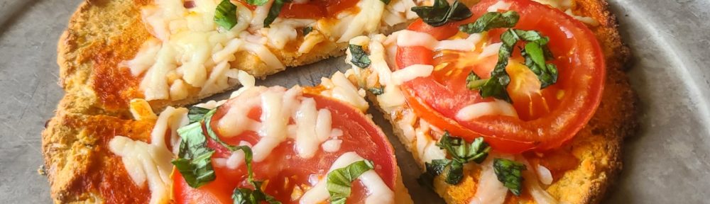 Put your trust in this crust for pizza night! A low-carb, high-protein, gluten-free pizza crust that tastes amazing and holds up to the toppings of your choice. Recipe makes two personal-sized crusts, each with 163 cal, 14g carb (4 net carb), 5g fat and 18g protein.