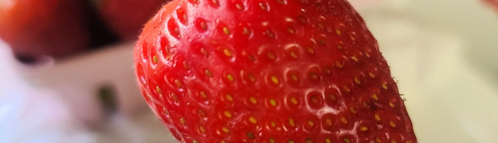 Learn how to hull a strawberry quickly and efficiently with this food prep hack that just uses a drinking straw! No knife, so safe for kids to help out making recipes and snacks.