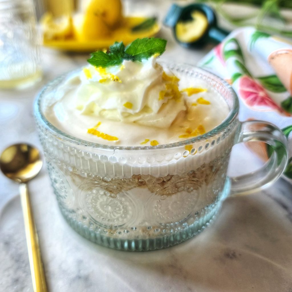 Lemon Protein Tiramisu made with cottage cheese, greek yogurt, protein powder, rice cakes and a lemon as the main ingredients.