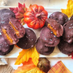 These easy protein pumpkin peanut butter cups are the perfect nearly sugar-free swap for Reese’s Cups, one of America’s favorite candies. Rich chocolate envelops a creamy center filled with protein and seasonal flavors. No bake, no guilt and a favorite homemade swap for Halloween candy.