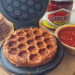 These savory waffles make a fiesta of flavor for breakfast and brunch or a quick, yummy dinner. You can even slice in quarters and serve with extra salsa or queso for tailgates and party appetizers. Easy and convenient thanks to jarred salsa and fat-free refried beans. The cornmeal base batter crooks them up crispy and golden. Delicious plain or topped with an egg, avocado or other creative toppings.