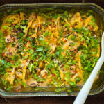 This Easy Veggie Dumpling Bake combines frozen dumplings, coconut curry sauce, and fresh vegetables for a quick, flavorful dinner. Ready in 30 minutes—customize with your favorite veggies or proteins!