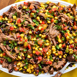 This easy Mexican-Style Pot Roast turns a chuck roast and a handful of pantry-friendly ingredients into tender, flavorful shredded beef you can use ALL week. Tacos tonight, taco salad tomorrow, loaded sweet potato the next day. Now that's my kind of meal prep!